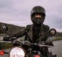 Woman on a motorcycle to illustrate a Rinvoq TV commercial