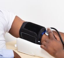 doctor measuring blood pressure