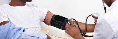 doctor measuring blood pressure